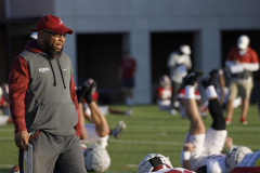 Alabama Running Backs Coach Robert Gillespie watches players stretch during Practice at Thomas-Drew Practice Fields in Tuscaloosa, AL on Tuesday, Nov 8, 2022.