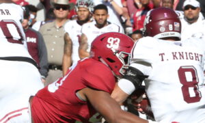 Alabama DL Jonathan Allen (#93) superman sacks Texas A&M's QB Trevor Knight in 2016 matchup.