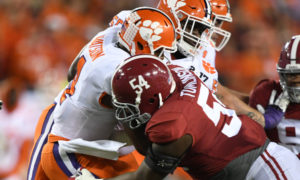Dalvin Tomlinson tackles Deshaun Watson of Clemson in 2017 CFP National Championship Game