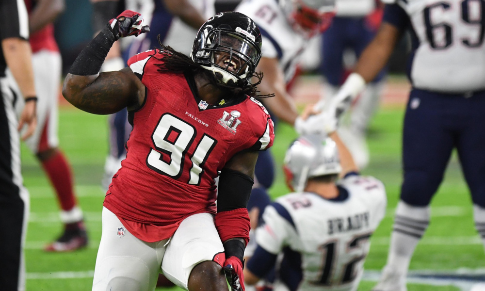 Courtney Upshaw celebrates sack of Tom Brady in 2017 Super Bowl matchup between Falcons and Patriots