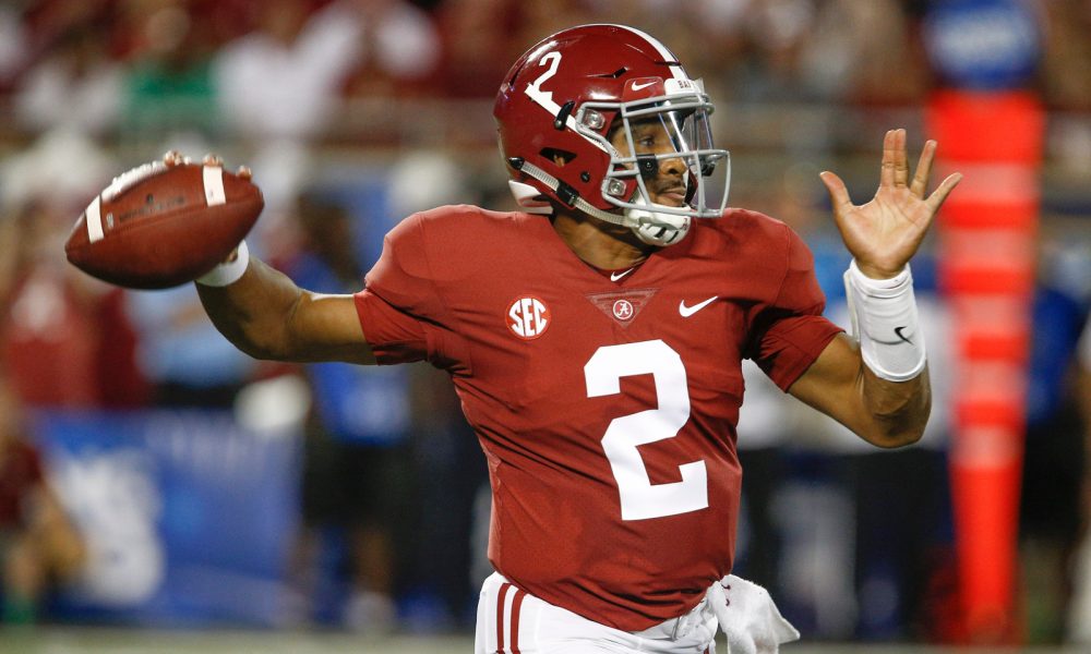 Jalen Hurts attempts a pass in 2018 vs. Louisville