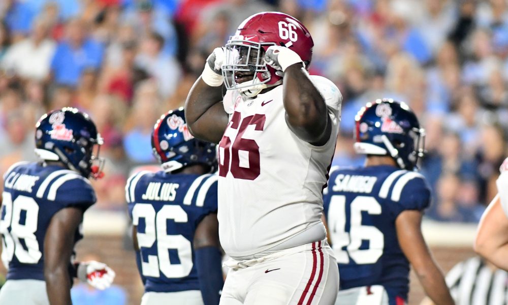 Lester Cotton celebrates a play versus Ole Miss for Alabama in 2018