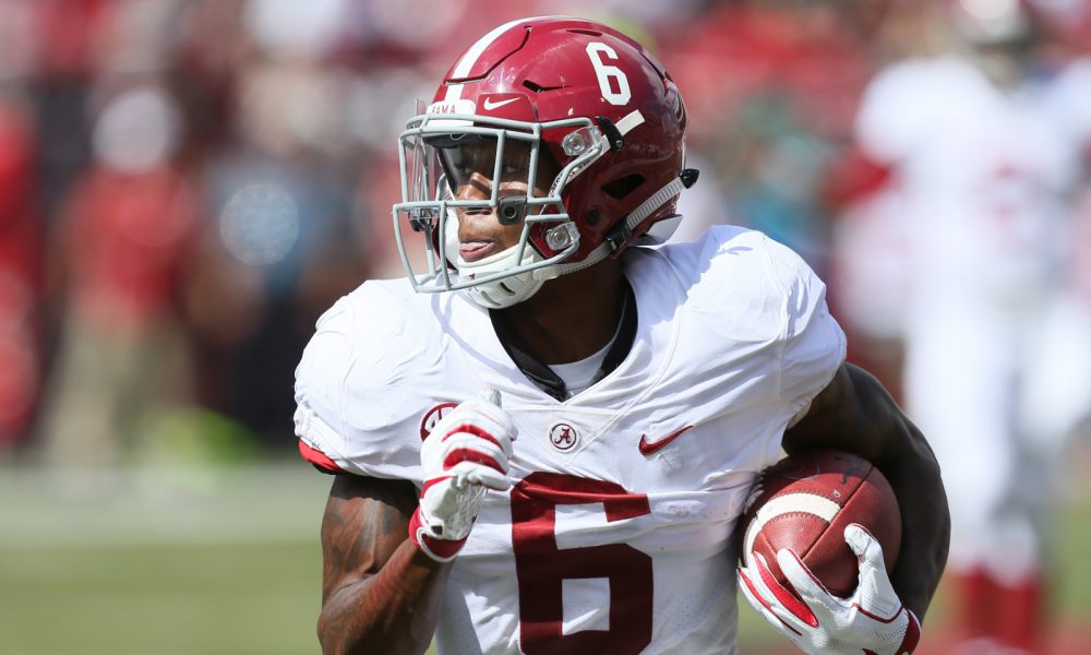 DeVonta Smith running down the sideline