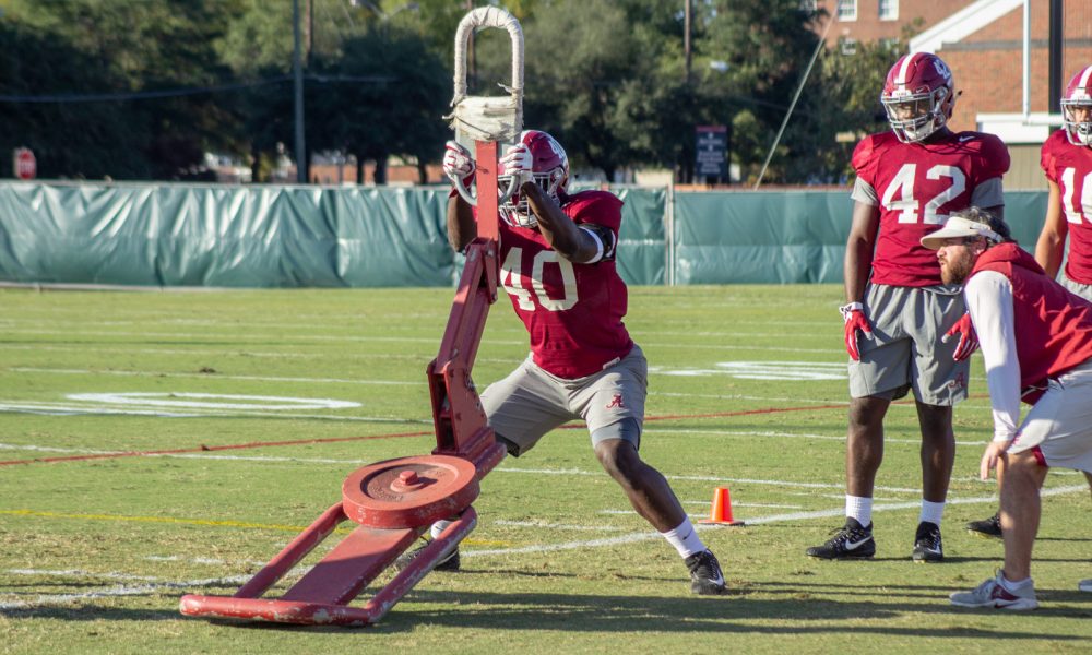 Joshua McMillon working sled at 2018 practice