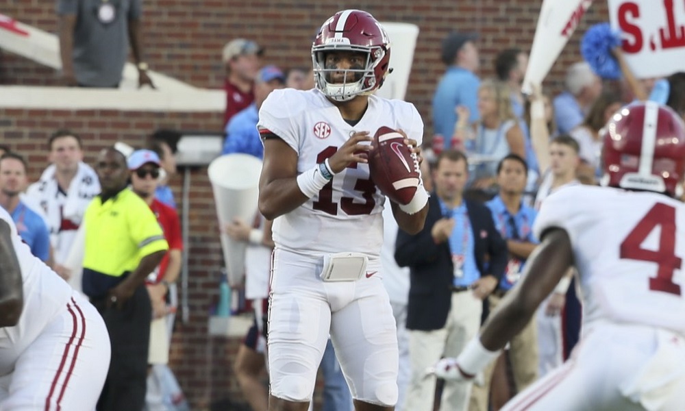 Tua Tagovailoa dropping back in the pocket to throw