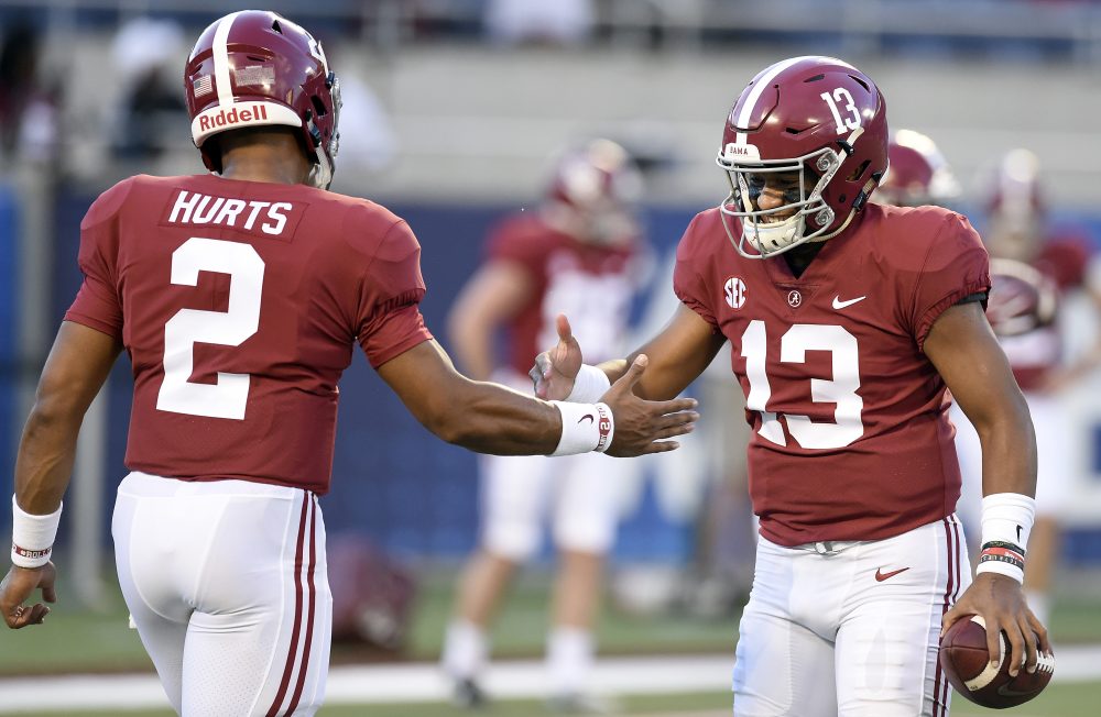 Jalen Hurts and Tua Tagovailoa with a handshake during 2018 season for Alabama football