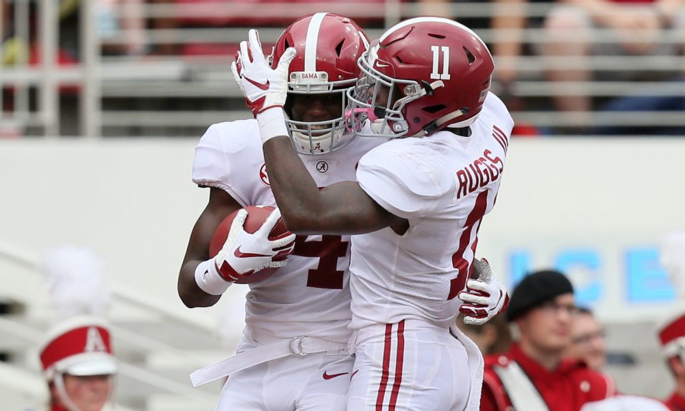 Henry Ruggs hugging Jerry Jeudy