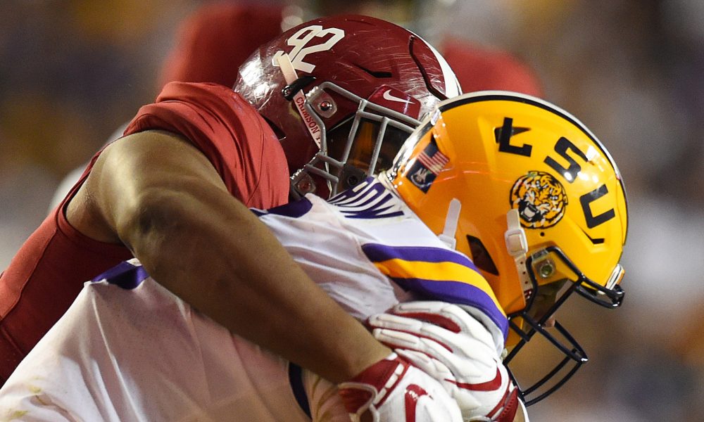 Quinnen Williams of Alabama sacks Joe Burrow of LSU in 2018 game