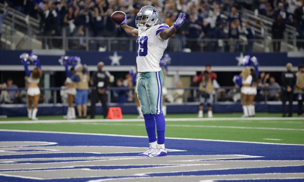 Amari Cooper celebrates scoring a touchdown for Cowboys in 2018 season