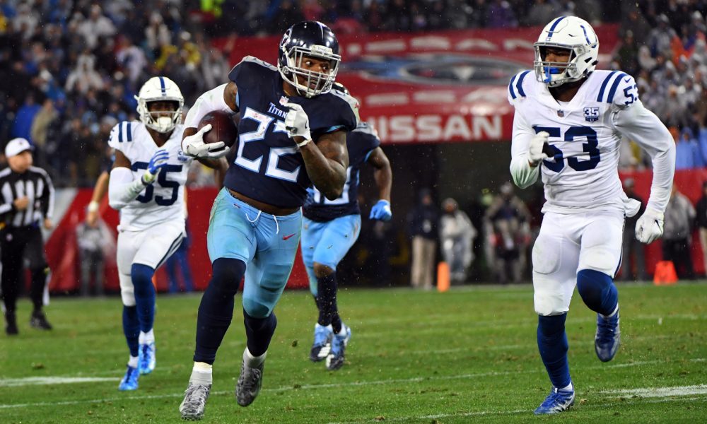 Derrick Henry brings joy to a young Titans fan by signing his helmet