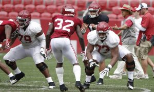 Evan Neal blocking at Alabama