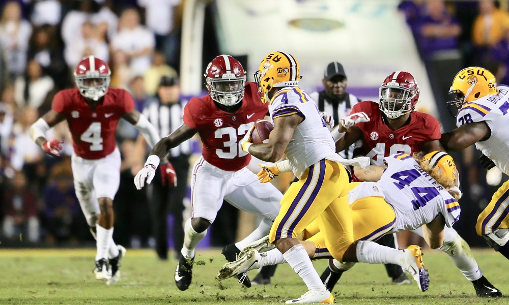Dylan Moses tackling LSU ball carrier