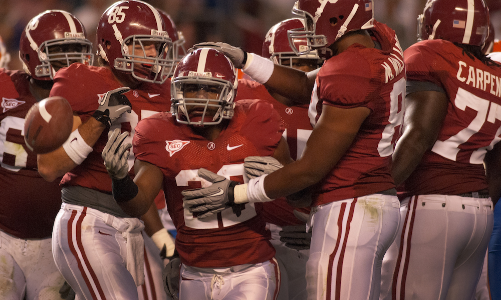 Mark Ingram celebrates with Alabama teammates after touchdown