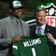 Quinnen Wiliams holding jersey with Roger Goodell