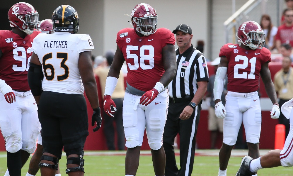 Christian Barmore standing on the field