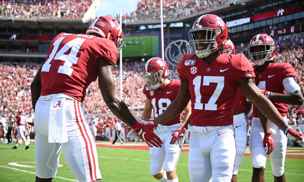 Alabama WR Jaylen Waddle celebrates TD versus Ole Miss in 2019 season