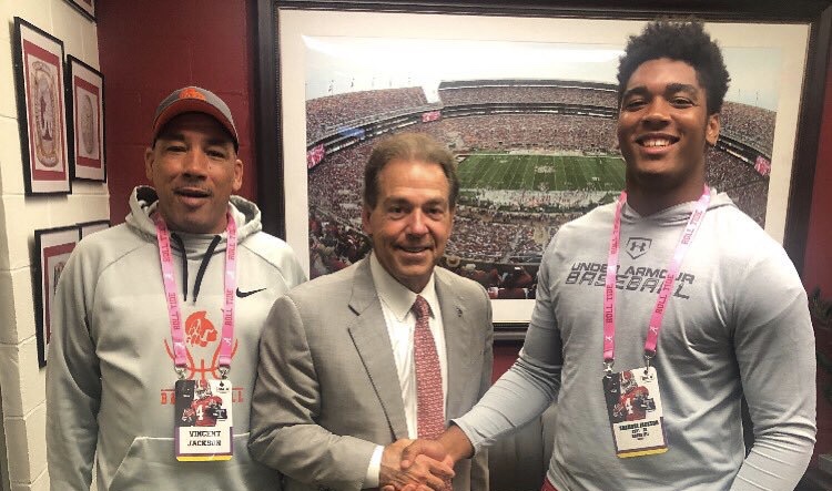 Shambre Jackson shaking Nick Saban's hand