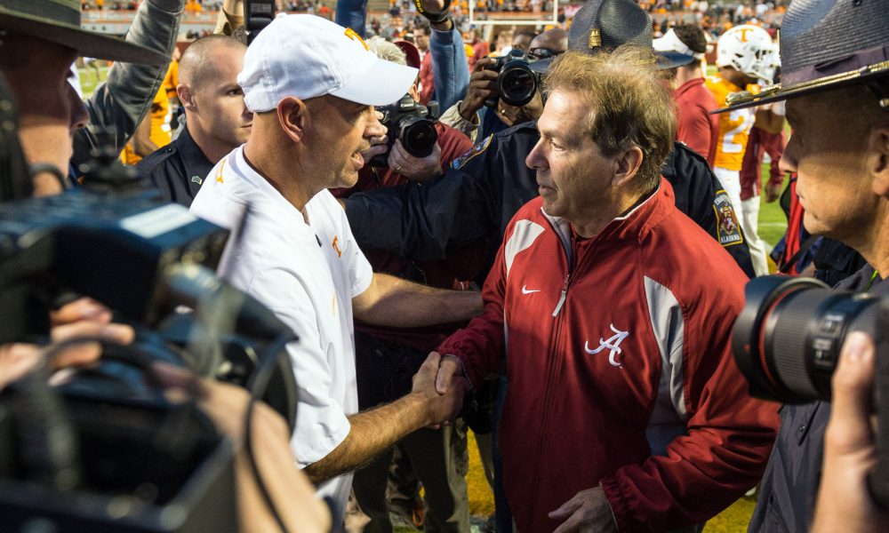 Nick Saban and Jeremy Pruitt meet at midfield after Alabama vs. Tennessee game in 2018
