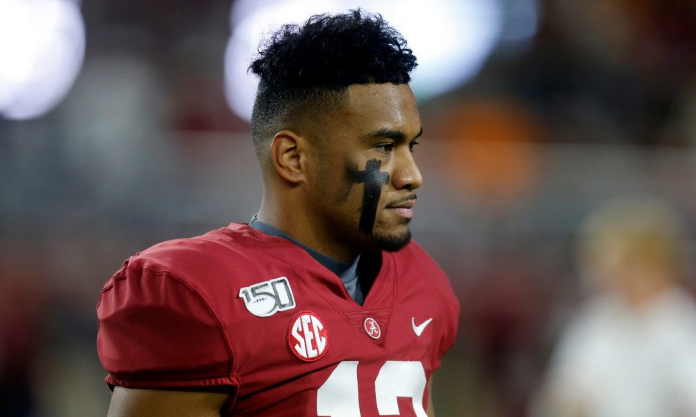 Tua looking like “Alabama Tua” with that red practice jersey 