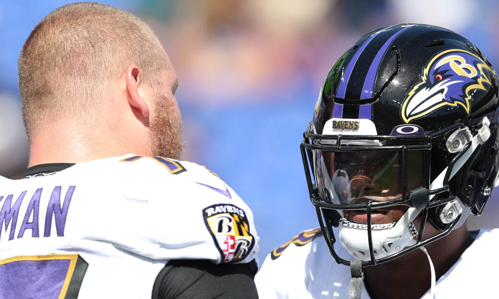 Bradley Bozeman (#77) talking to Ravens' QB Lamar Jackson prior to 2019 game versus the Cardinals