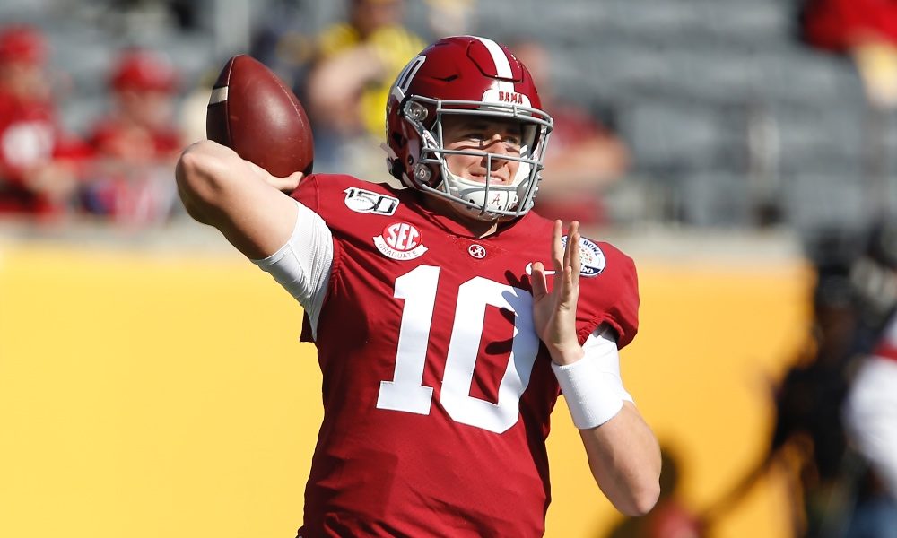 Mac Jones attempting to throw a pass versus Michigan in the Citrus Bowl