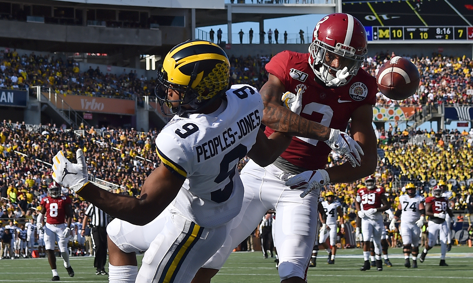 Alabama CB Patrick Surtain breaks up a pass versus Michigan in 2020 Citrus Bowl