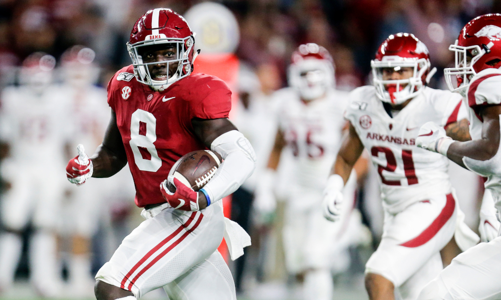 Christian Harris (#8) recovers and returns a fumble for Alabama versus Arkansas in 2019