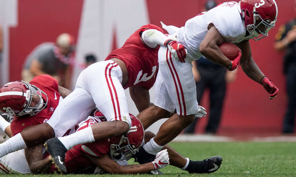 Mac Jones connects with John Metchie for two touchdowns during the