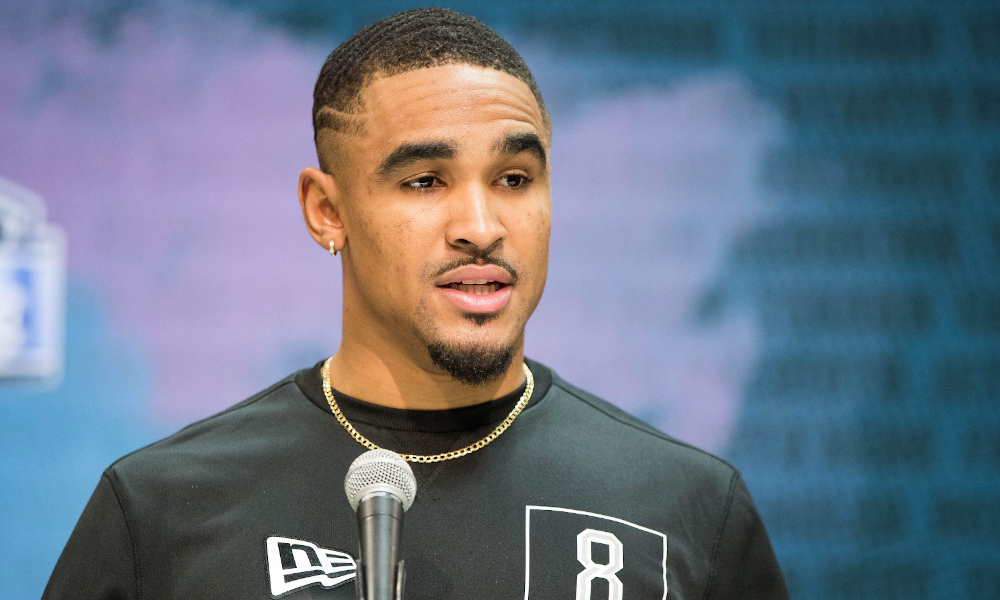 Jalen Hurts at the podium for an interview during the 2020 NFL Scouting Combine
