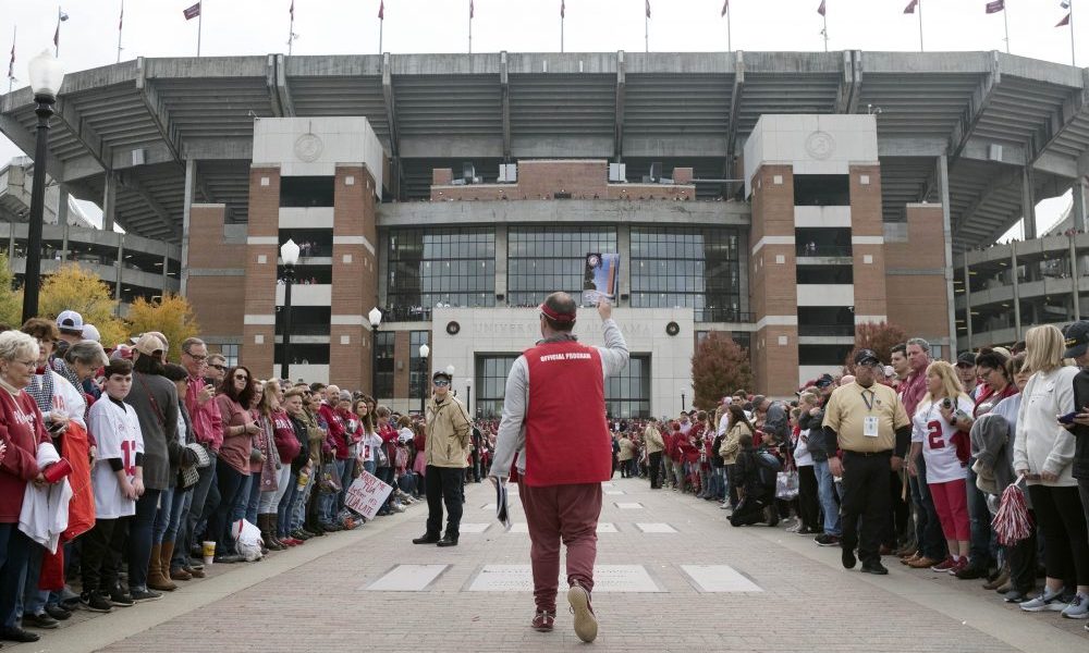 Fans outside Bryant-Denny Stadium waiting for Alabama football players during 2020 season