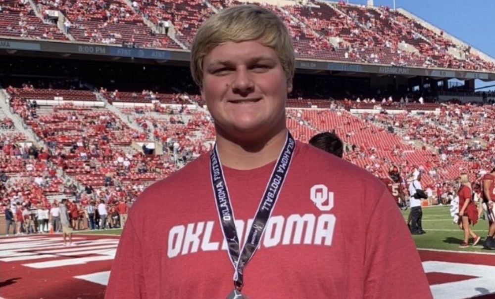 Jacob Sexton poses for picture doing Oklahoma visit