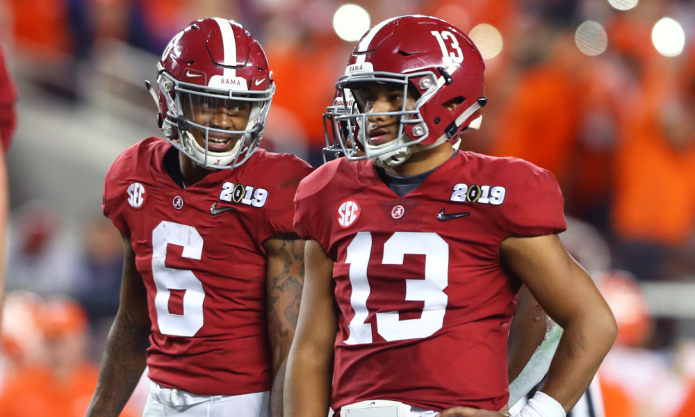 Tua Tagovailoa and Devonta Smith stand beside each other during 2019 CFP title game vs. Clemson