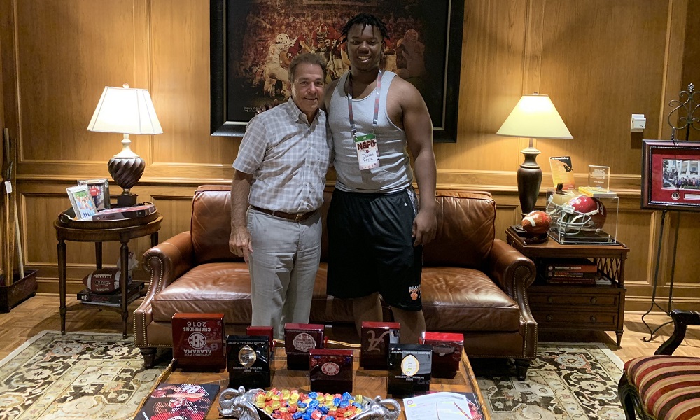 5-Star DT damon payne posing for photo with nick saban