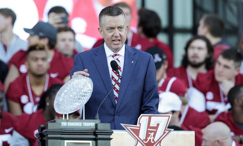 Greg Byrne talking at the podium