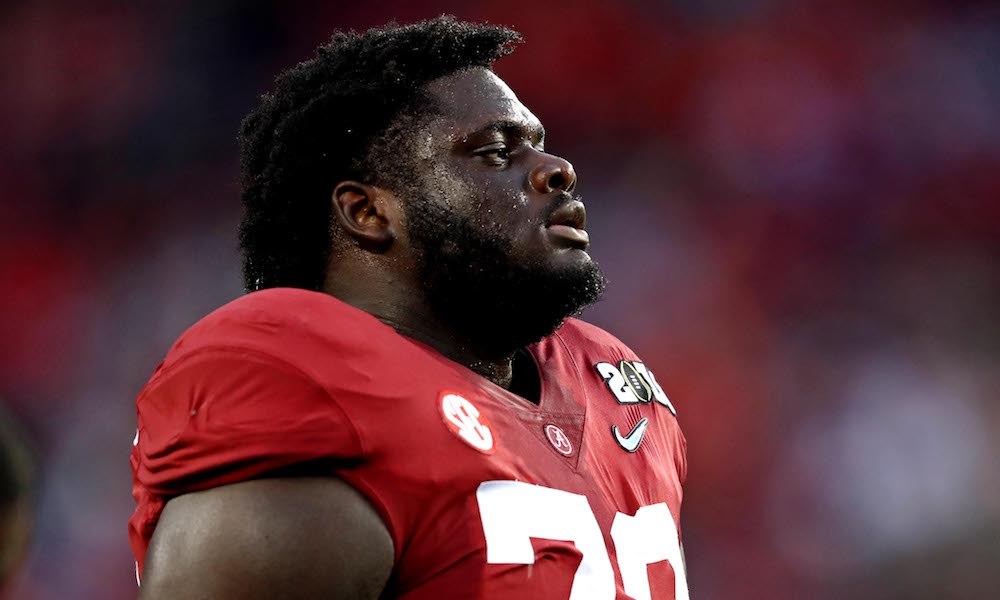 Alex Leatherwood looks onto the field during 2019 CFP National Championship Game versus Clemson
