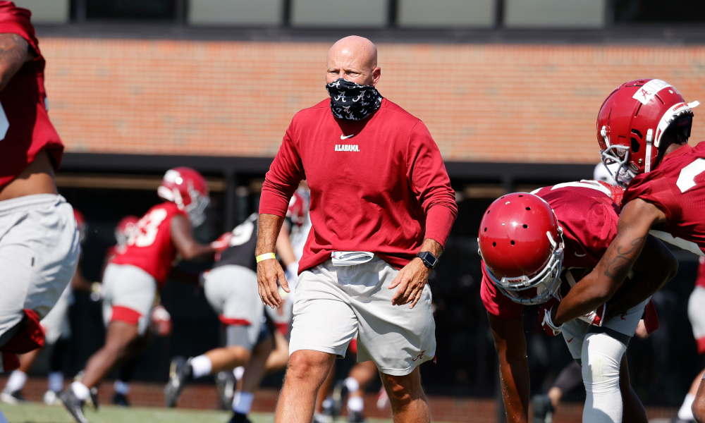 Charles Kelly, Alabama's safeties coach, working with his group at fall camp