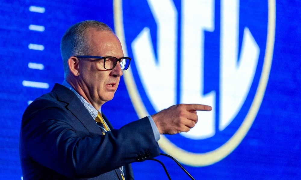 Greg Sankey answers a question at SEC Media Days