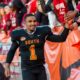 Jalen Hurts high gives fans following the Senior Bowl