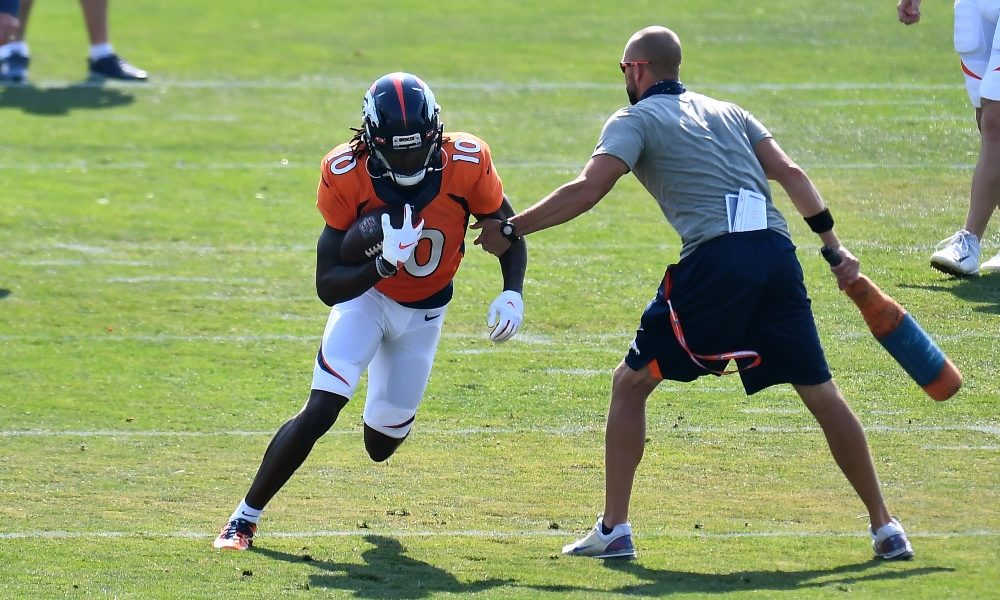 Jerry Jeudy turns up field during a drill at Broncos training camp