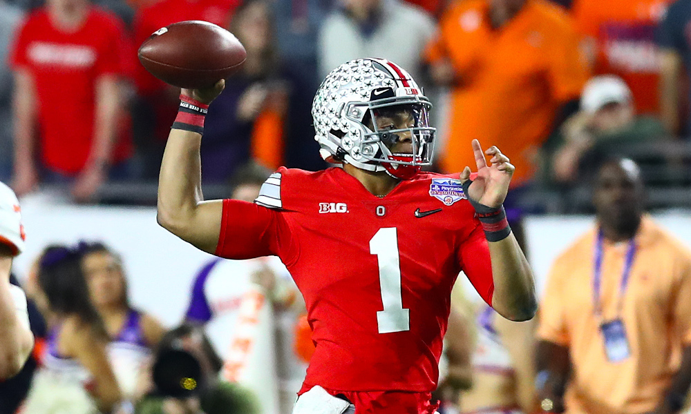 Justin Fields of Ohio State attempting a pass during 2019 CFP semifinal matchup (Fiesta Bowl) versus Clemson