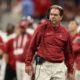 Nick Saban walks the sidelines of the SEC Championship game against Georgia