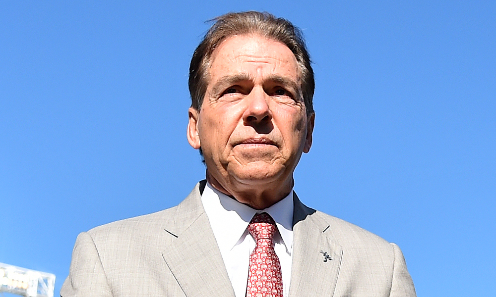 Nick Saban of Alabama walking across Camping World Stadium before facing Michigan in the 2020 Citrus Bowl