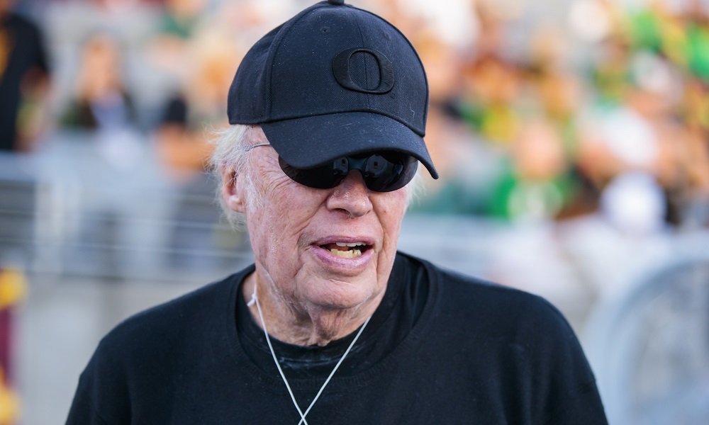 Phil Knight attending Oregon Ducks football game