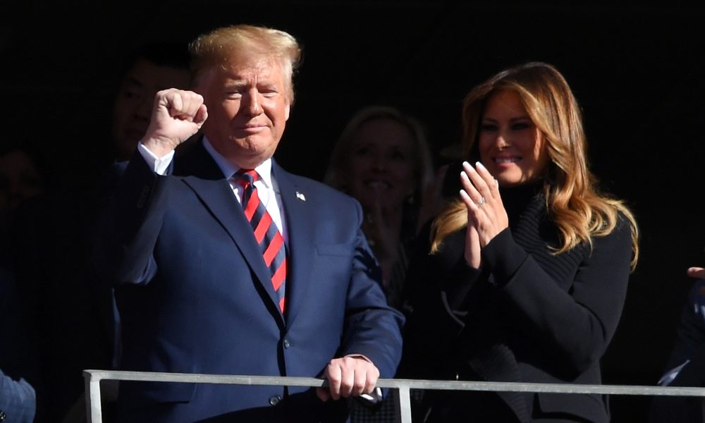 President Donald Trump and wife Melania address crowd during Alabama vs LSU game