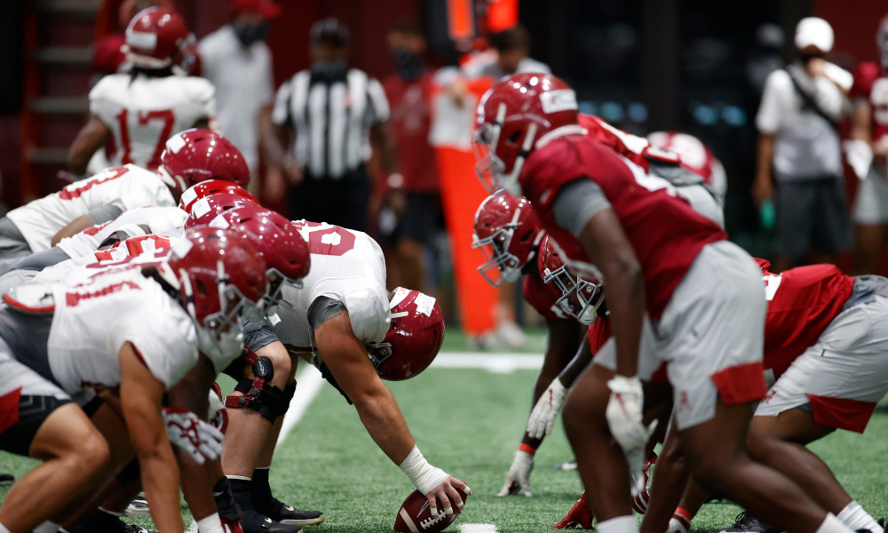 Alabama's offensive line about to snap the ball in fall camp