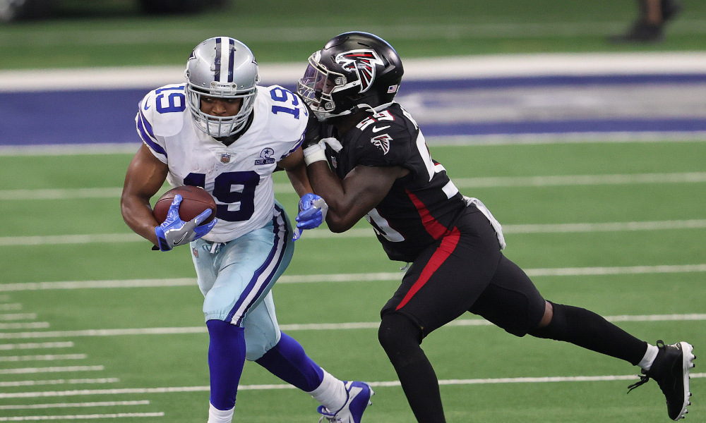 Amari Cooper with the ball for the Cowboys against the Falcons
