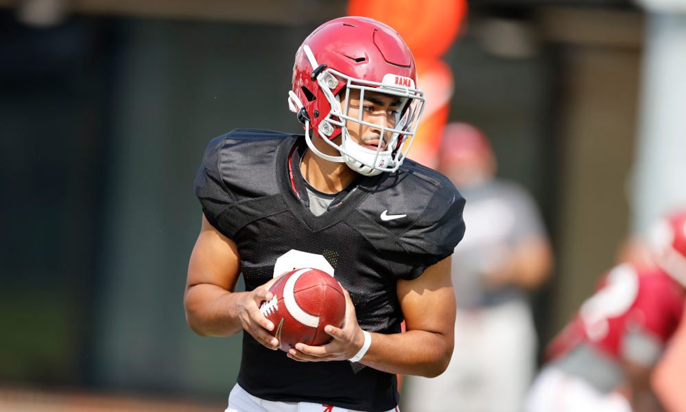 Bryce Young holds football at Alabama 2020 fall practice
