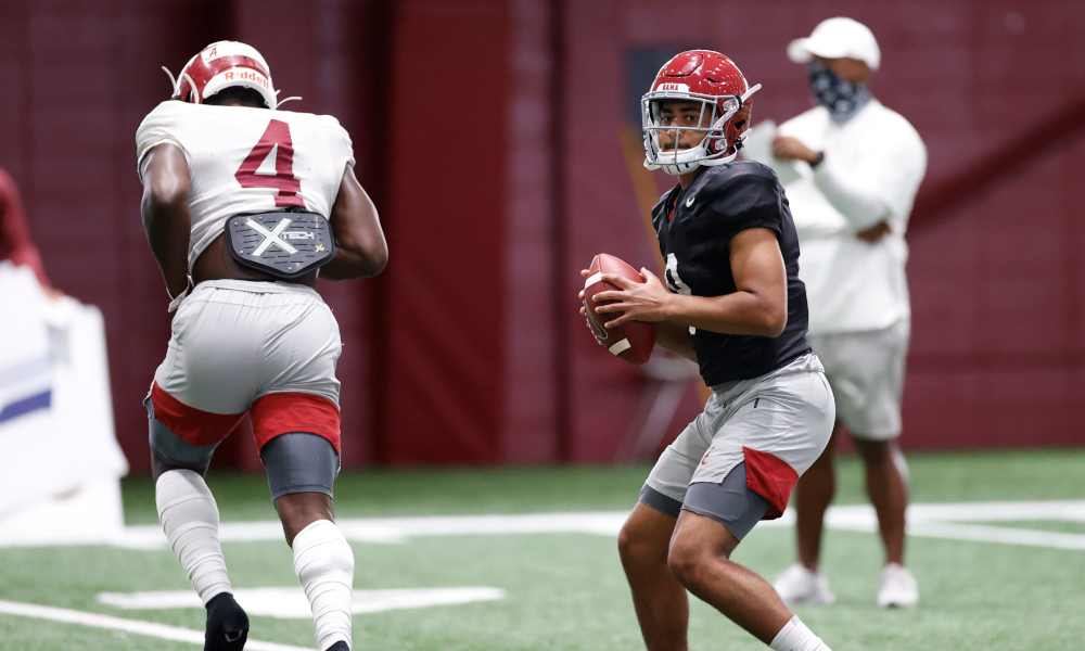 Bryce Young holds ball in the pocket at Alabama fall camp