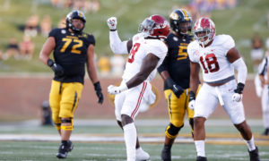 Christian Harris (No. 8) of Alabama celebrates defensive play for Alabama versus Missouri