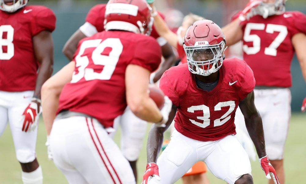 Dylan Moses shapes up for a tackle during Alabama's practice
